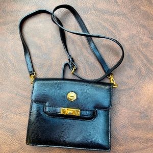 Small black leather purse by Eliana.